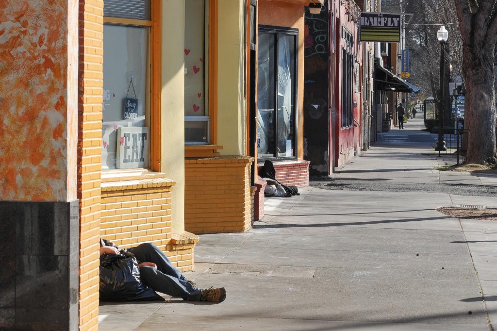 Homeless sleeping in the doorways of shops in Sacramento.