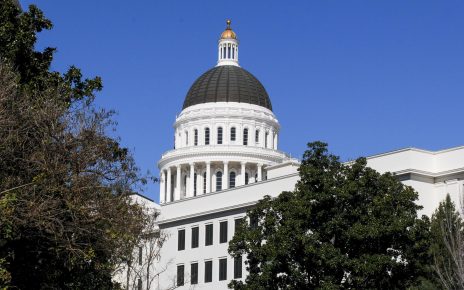California State Capitol dome shines against blue sky